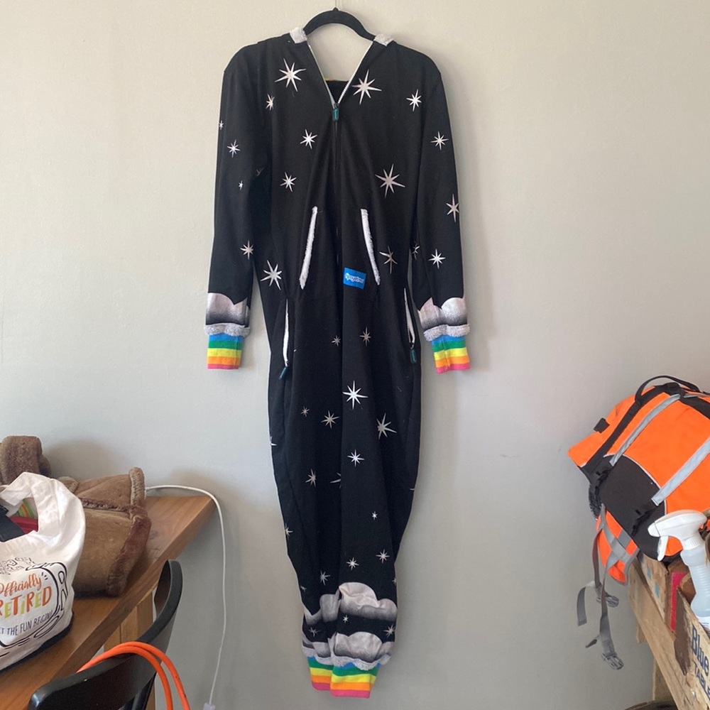 Tipsy elves unicorn onesie size small in great condition wore once for Halloween
